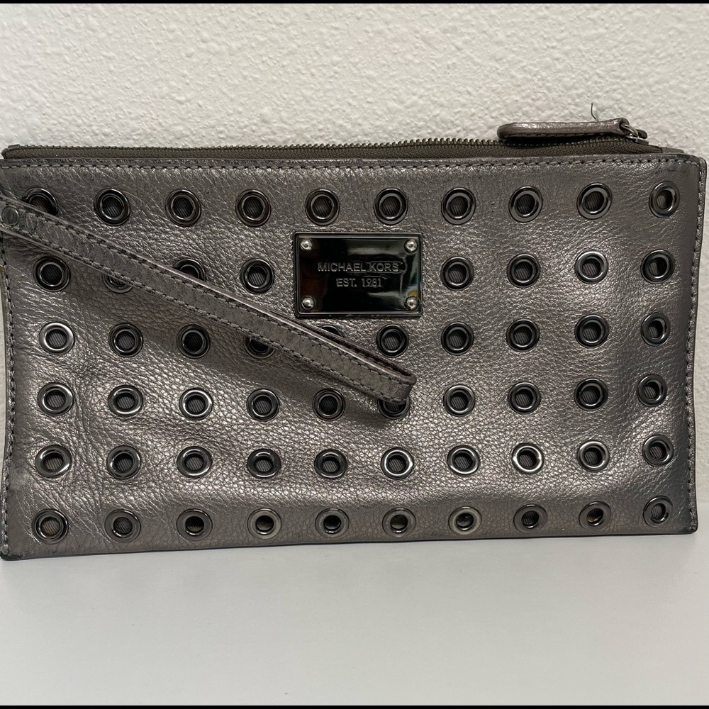 Michael Kors Grommet/Stud Clutch color Silver